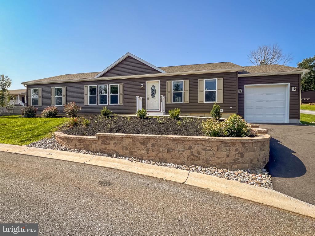 146 Minch Road Parkesburg, PA 19365 - Photo 4 of 44 a front view of a house with a yard