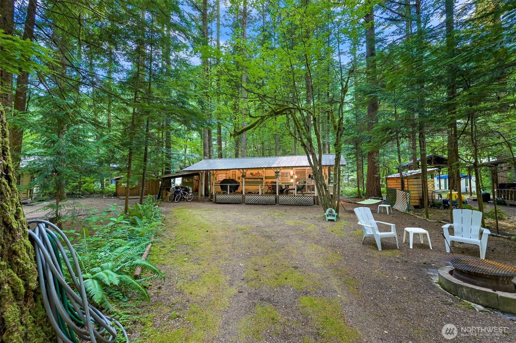 1107 Birch Lane Maple Falls, WA 98266 - Photo 16 of 40 a view of a house with backyard and sitting area