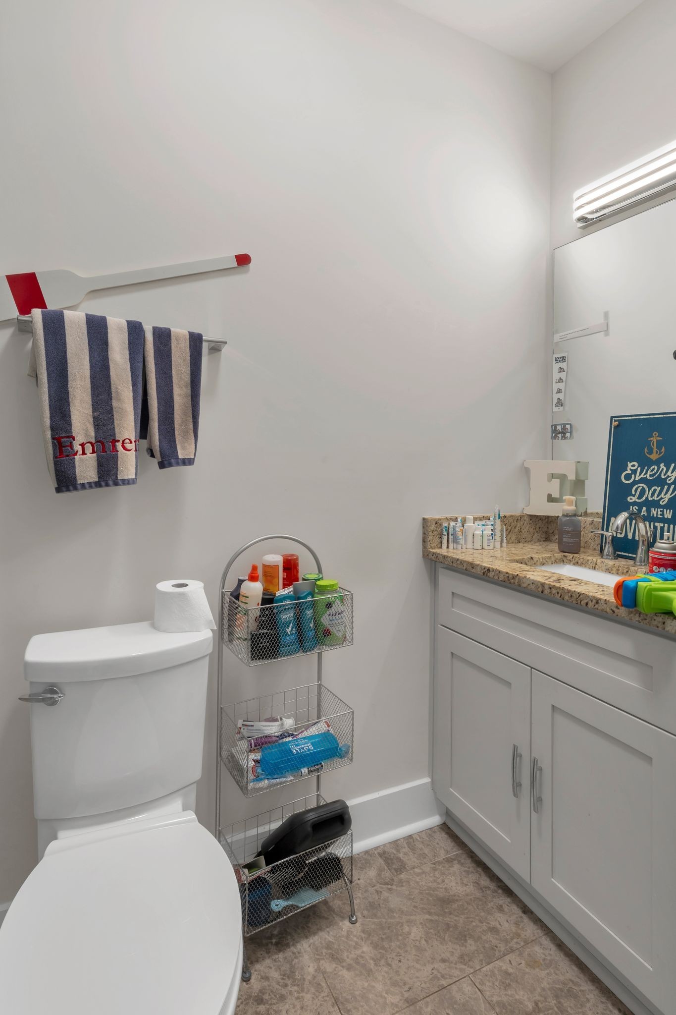 1708 Comanche Run Madison, TN 37115 - Photo 20 of 36 a white toilet sitting next to a bathroom sink