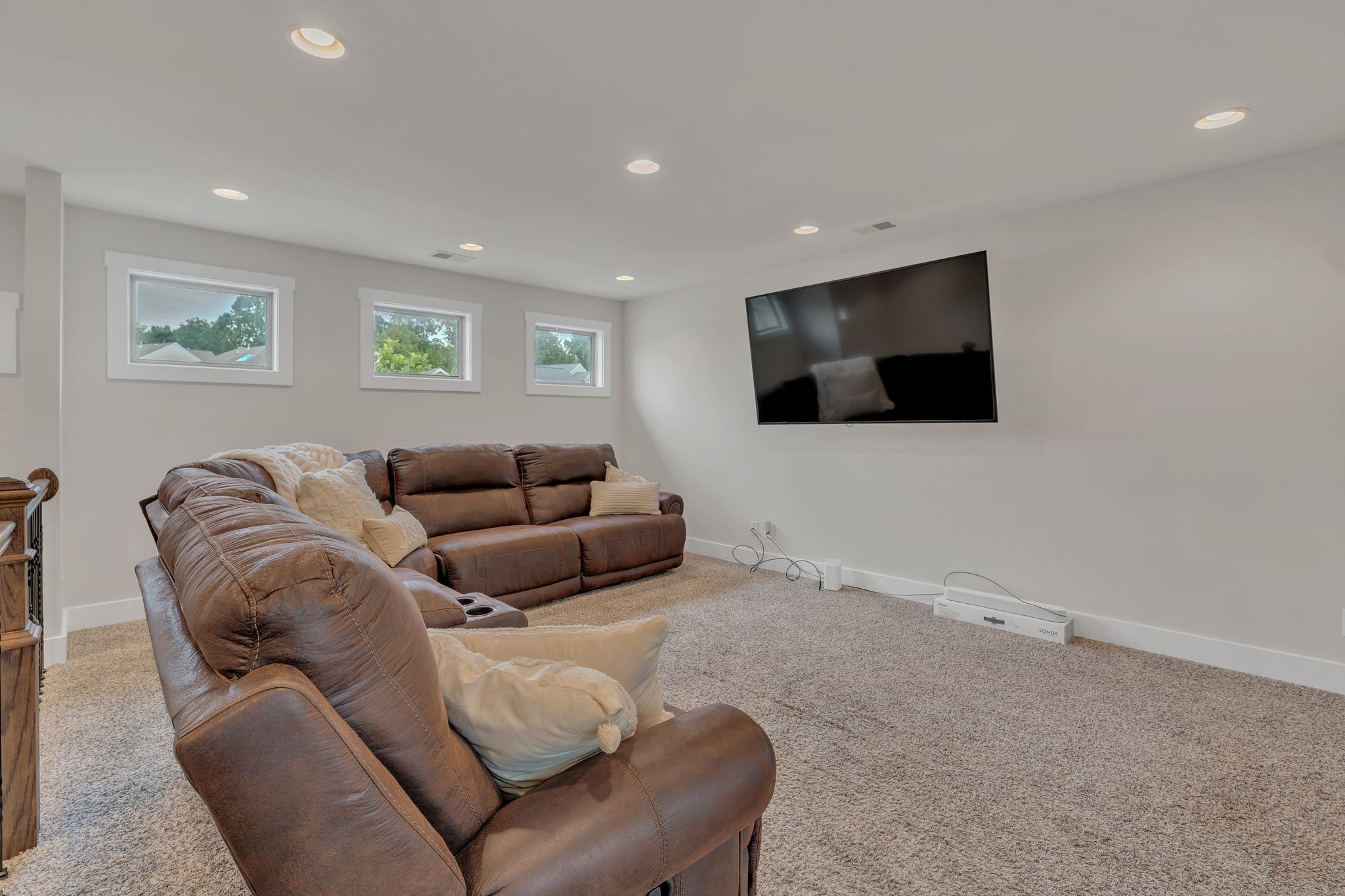 1708 Comanche Run Madison, TN 37115 - Photo 23 of 36 a living room with furniture and a flat screen tv