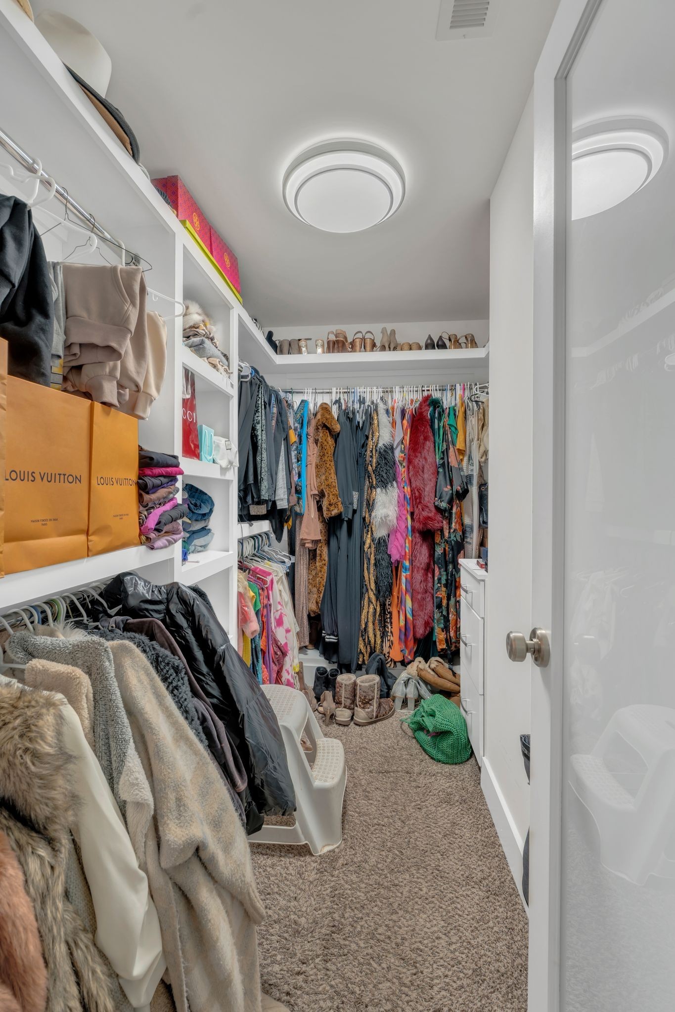 1708 Comanche Run Madison, TN 37115 - Photo 27 of 36 a view of walk in closet with clothes