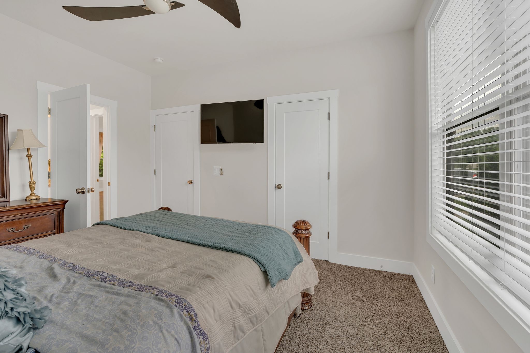 1708 Comanche Run Madison, TN 37115 - Photo 7 of 36 a bedroom with a bed and a flat screen tv