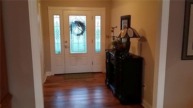5846 Shady Grove Road Morrison, TN 37357 - Photo 3 of 20 a view of a hallway with wooden floor and windows