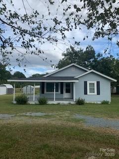 1914 John Moore Road Monroe, NC 28110 - Photo 1 of 27 a view of a house with a yard