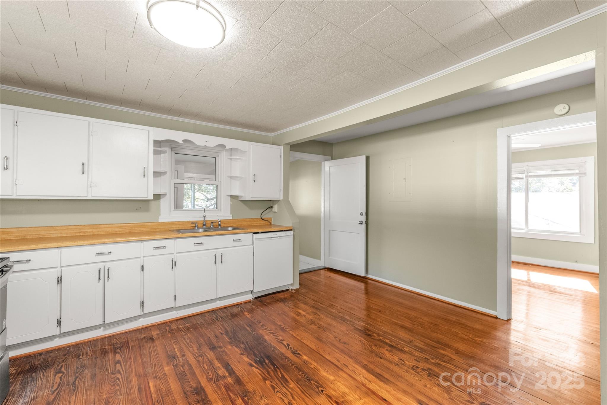 1914 John Moore Road Monroe, NC 28110 - Photo 15 of 27 a view of a kitchen with wooden floor