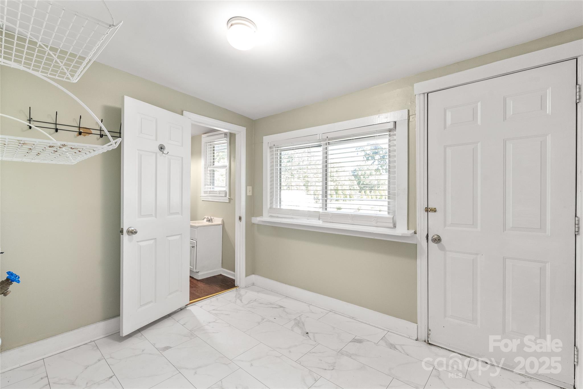 1914 John Moore Road Monroe, NC 28110 - Photo 22 of 27 a view of a hallway with a bathroom