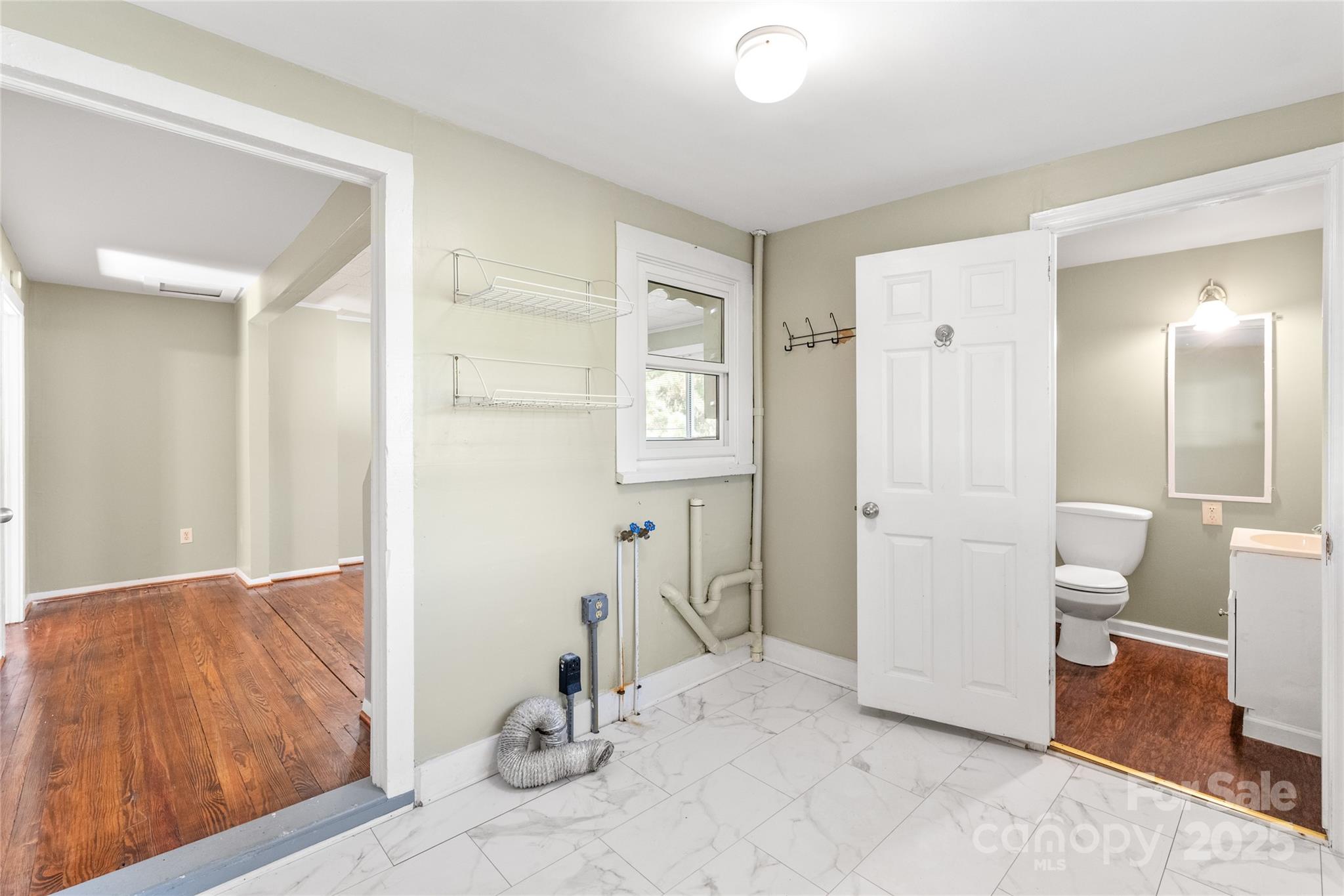 1914 John Moore Road Monroe, NC 28110 - Photo 23 of 27 a view of a room with mirror and bathroom