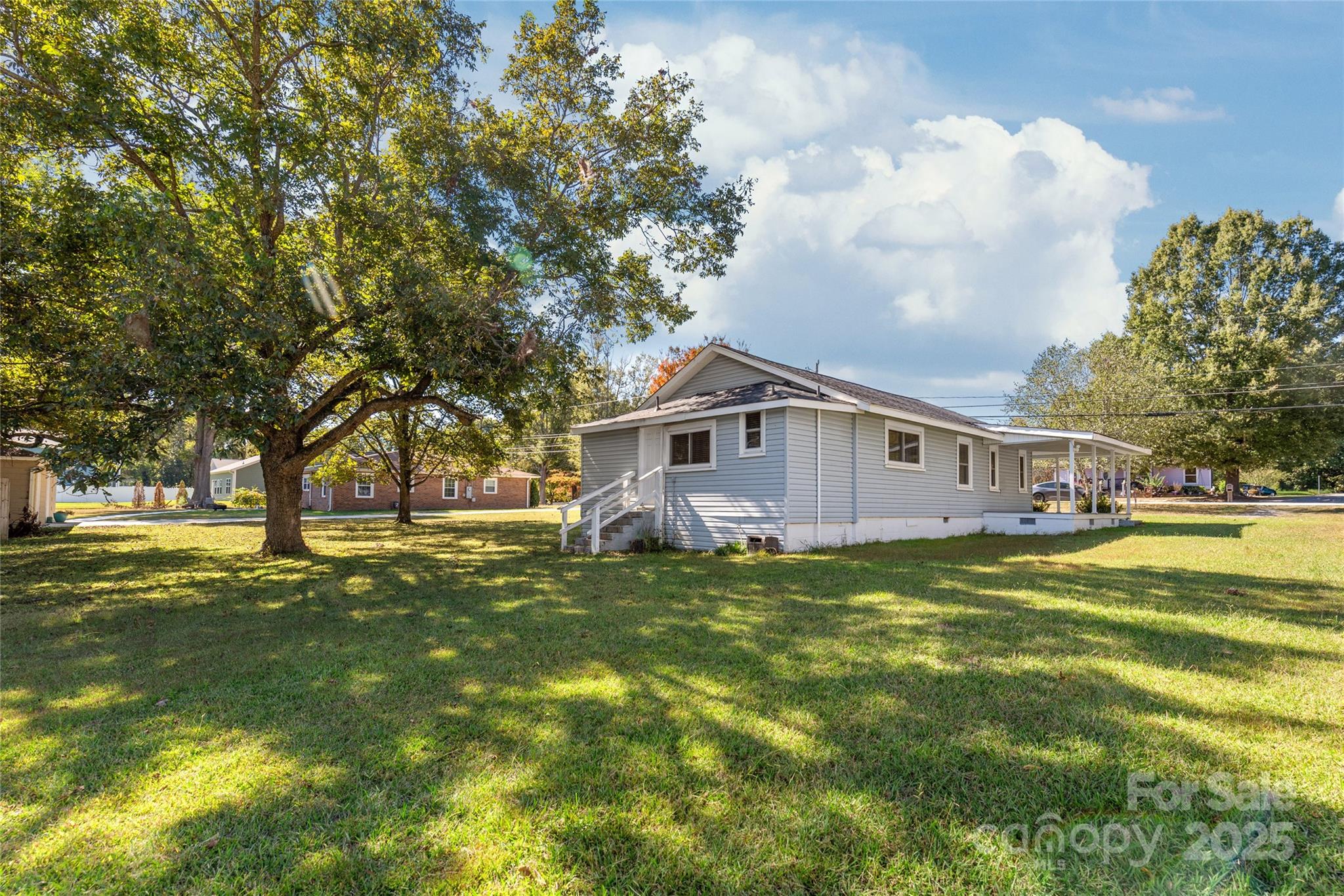 1914 John Moore Road Monroe, NC 28110 - Photo 26 of 27 a house view with swimming pool in front of it