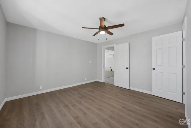 a bathroom with a sink a mirror and a toilet