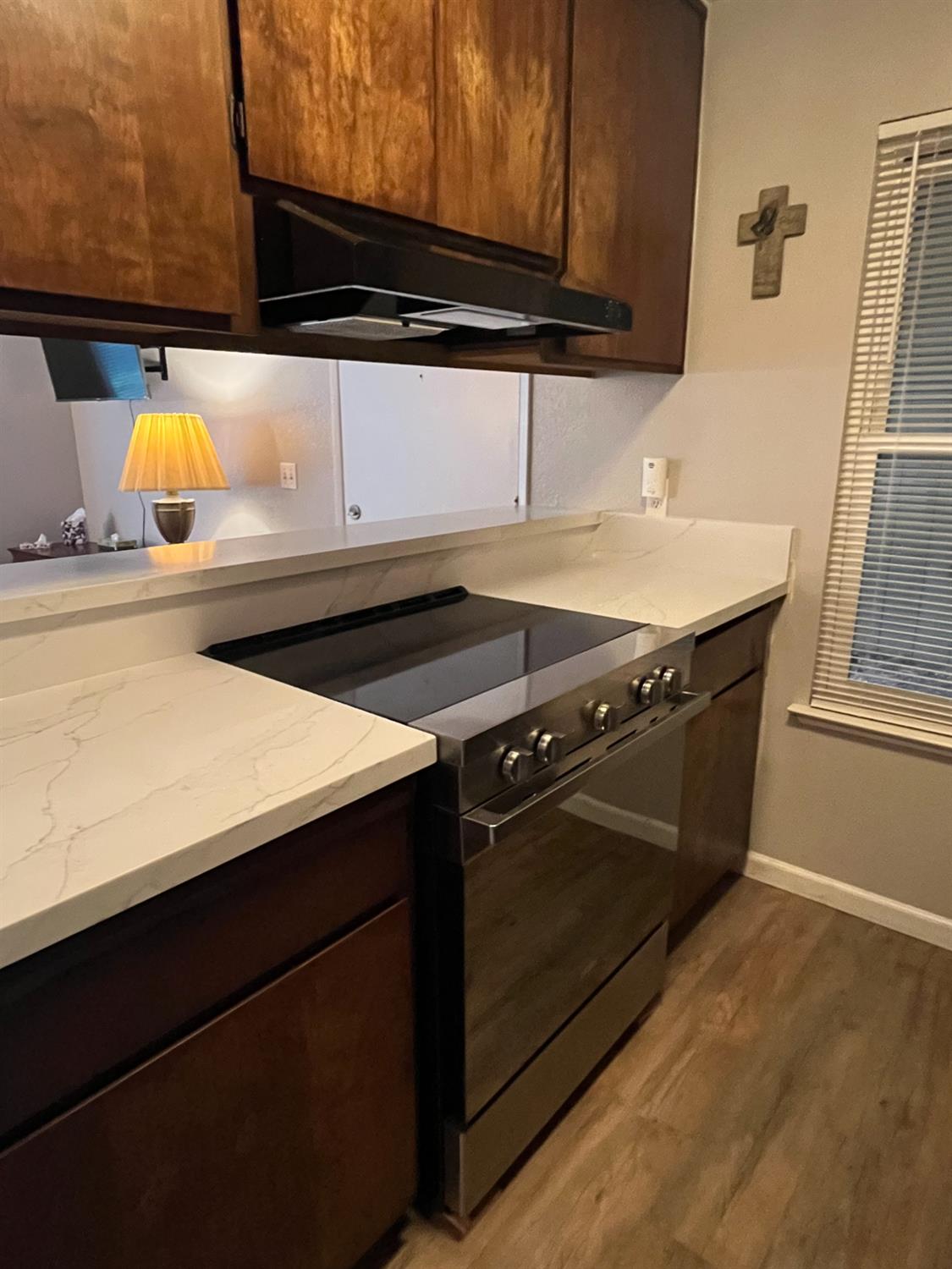 6724 Plymouth Road, Unit 33 Stockton, CA 95207 - Photo 5 of 12 a close view of stove and microwave