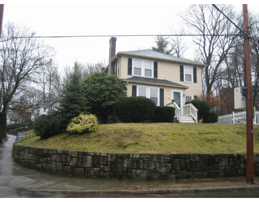 199 Langley Road, Unit 1 Newton, MA 02459 - Photo 1 of 1 a view of a house with snow
