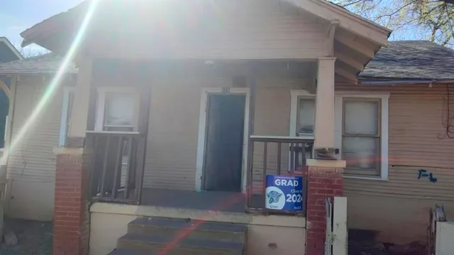 a view of hallway with seating space