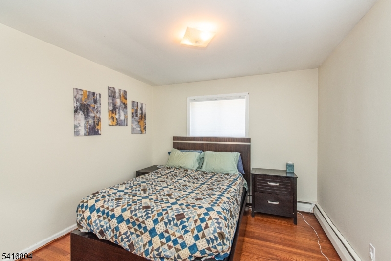 26 Green Road Mine Hill, NJ 07803 - Photo 6 of 21 a bedroom with a bed and a window