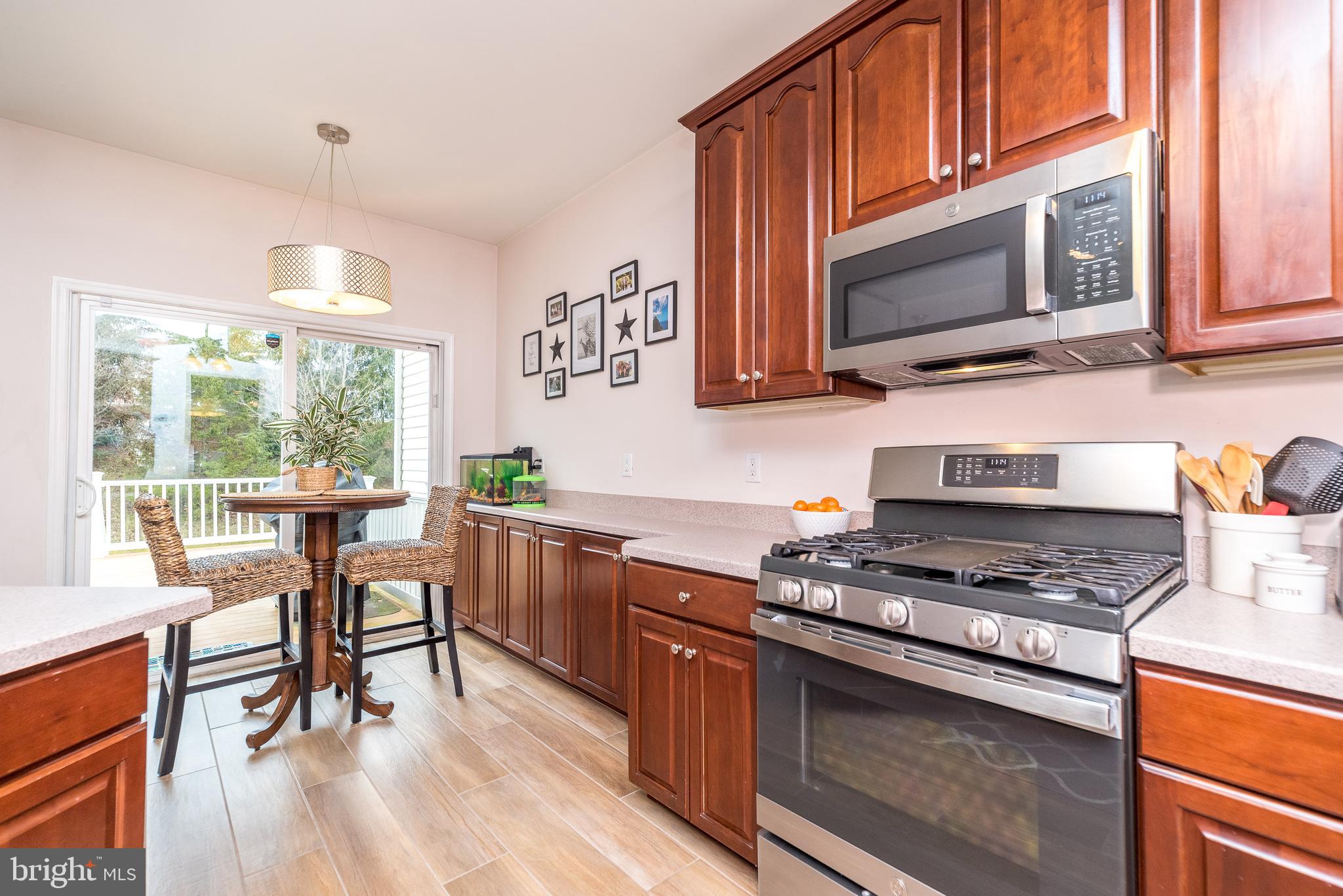 227 Coventry Road Chalfont, PA 18914 - Photo 12 of 52 Built in microwave and gas cooking