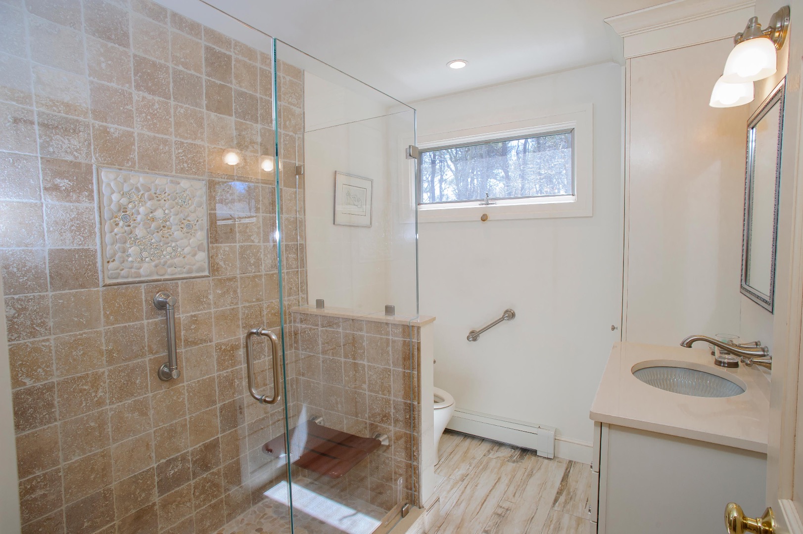 237 Lagoon Pond Road Vineyard Haven, MA 02568 - Photo 14 of 21 a bathroom with a sink a toilet a mirror and shower