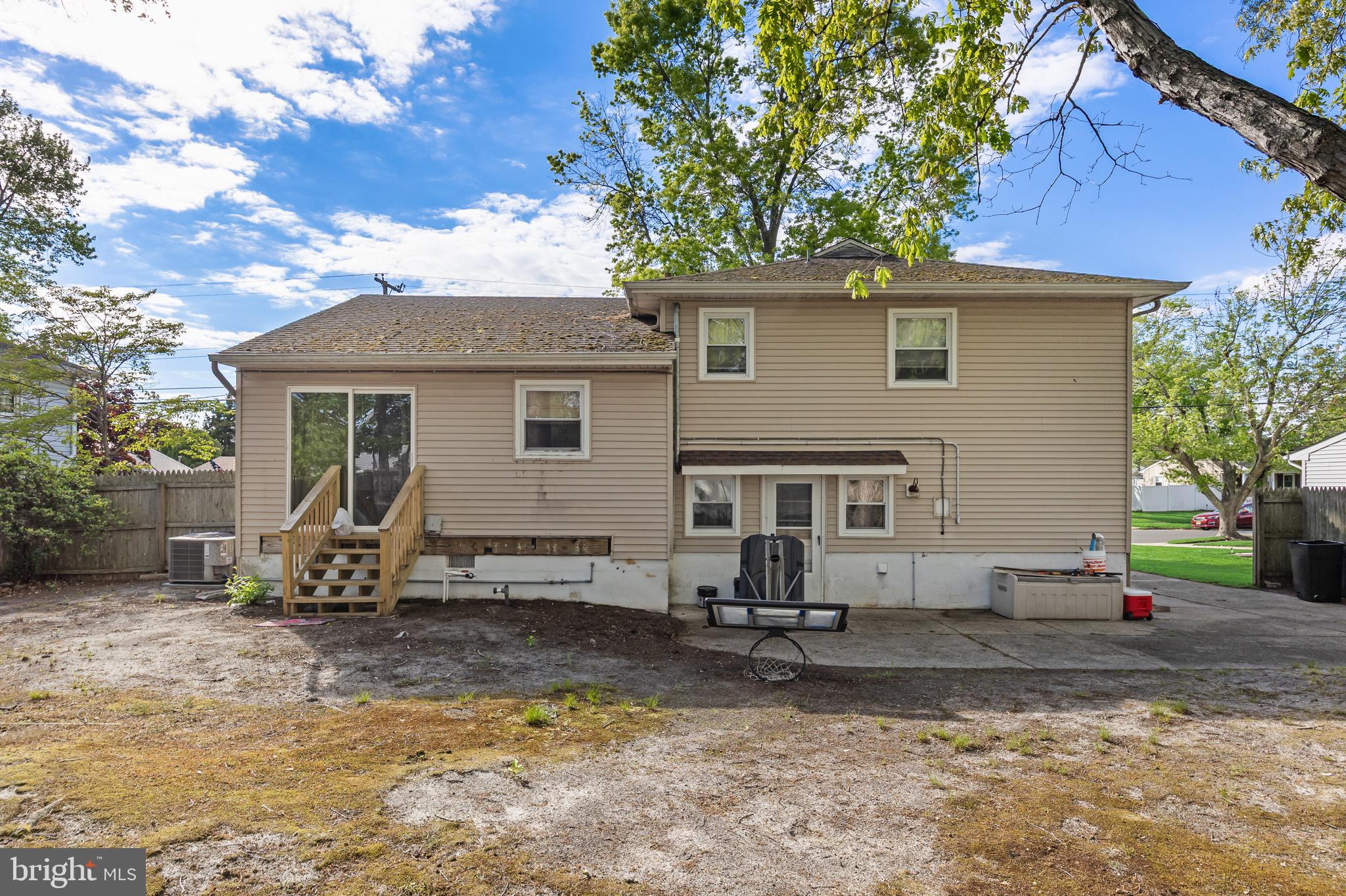 109 North Ambler Road Somers Point, NJ 08244 - Photo 21 of 22 a backyard of a house with seating space