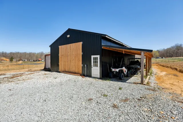 a picture of a room with a white wall and white cabinet