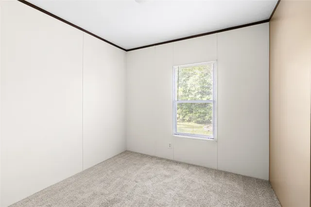 a view of a window in an empty room