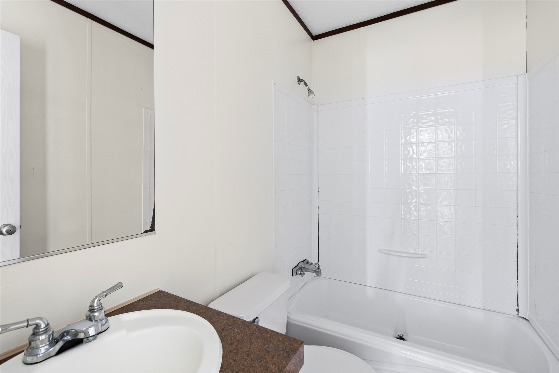 443 West Lone Oak Road Onalaska, TX 77360 - Photo 14 of 21 a bathroom with a sink toilet and shower