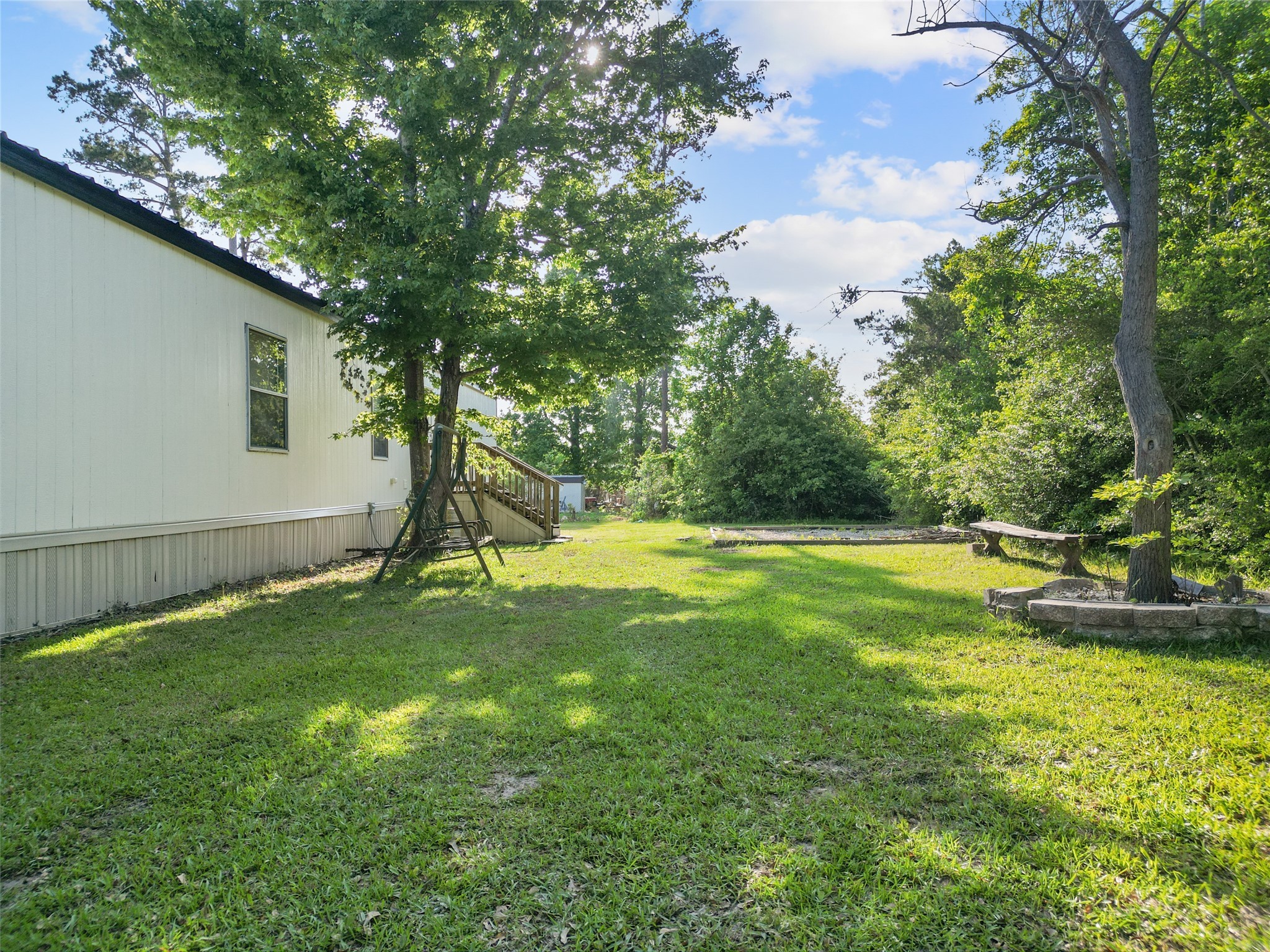 443 West Lone Oak Road Onalaska, TX 77360 - Photo 15 of 21 a view of a backyard with swimming pool
