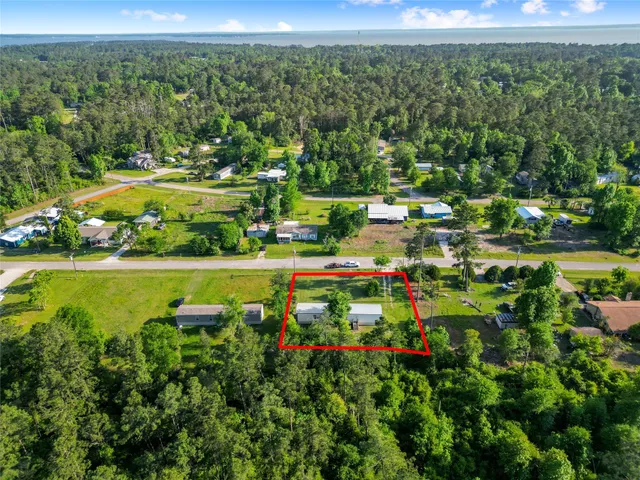 a view of a lake with a house