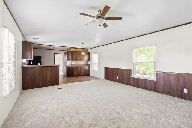 a bedroom with furniture and window