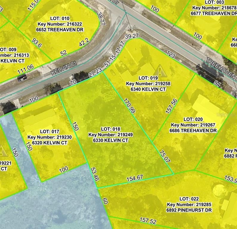 6330 Kelvin Court Spring Hill, FL 34606 - Photo 9 of 9 a sign on the wall with a sign board