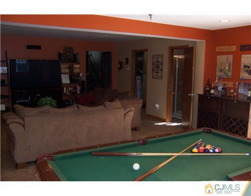 69 Morningside Road Colonia, NJ 07067 - Photo 20 of 25 a view of outdoor space and barbecue grill