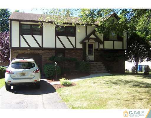 69 Morningside Road Colonia, NJ 07067 - Photo 24 of 25 a house view with a outdoor space