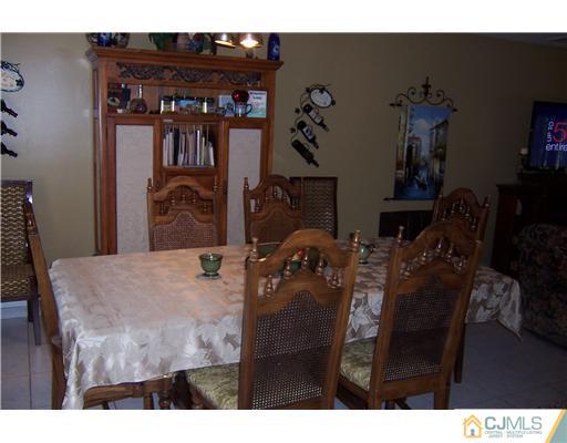 69 Morningside Road Colonia, NJ 07067 - Photo 7 of 25 a view of livingroom and dining room