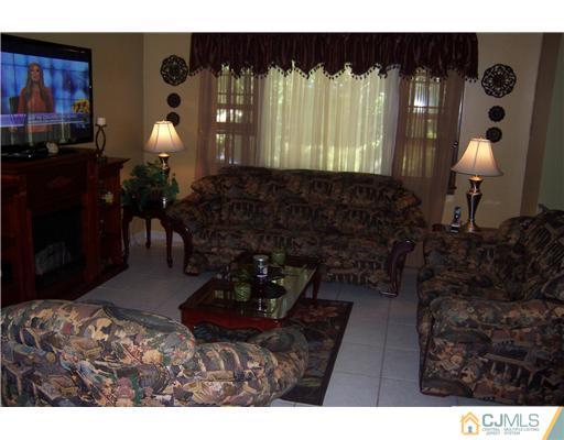 69 Morningside Road Colonia, NJ 07067 - Photo 9 of 25 a living room with furniture