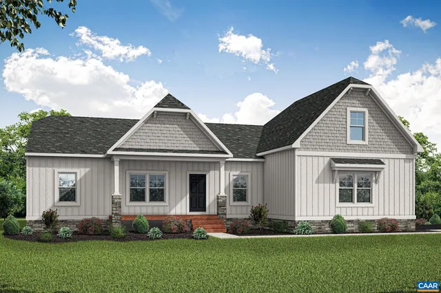 a front view of a house with a garden and plants