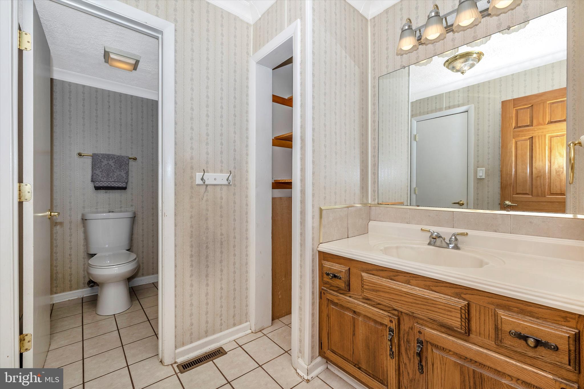 10825 Powell Road Thurmont, MD 21788 - Photo 30 of 53 Main level full bath, door to hallway and bedroom