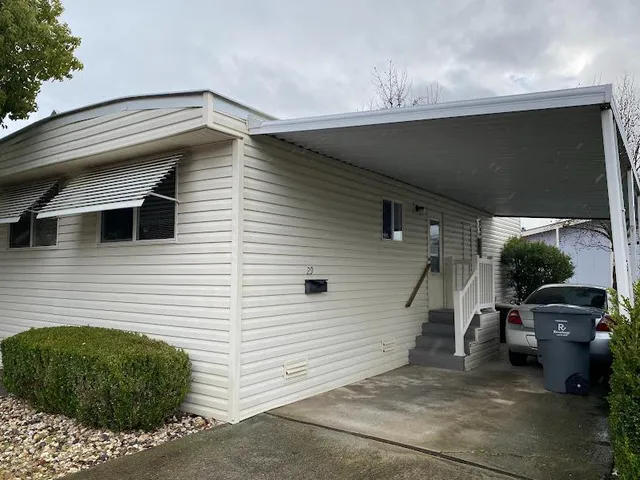 a view of a back yard of the house