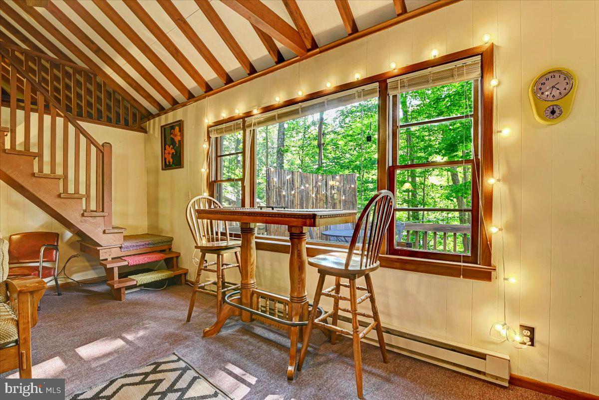 112 Beechwood Cove Road Greentown, PA 18426 - Photo 21 of 59 a dining room with furniture and a window