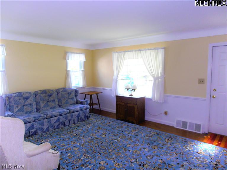 1596 Brainard Road Lyndhurst, OH 44124 - Photo 6 of 15 Living Room freshly painted and hardwood floors
