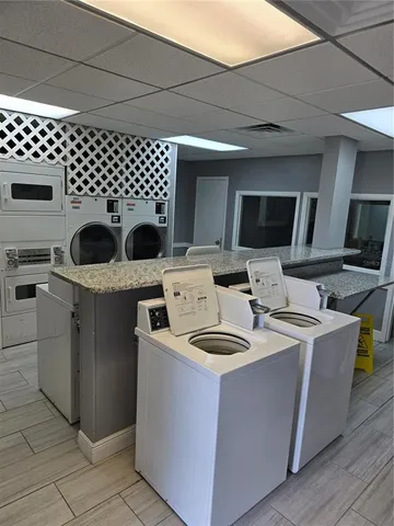 a kitchen with a stove and a microwave