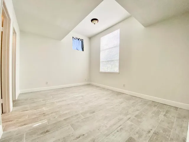 an empty room with windows