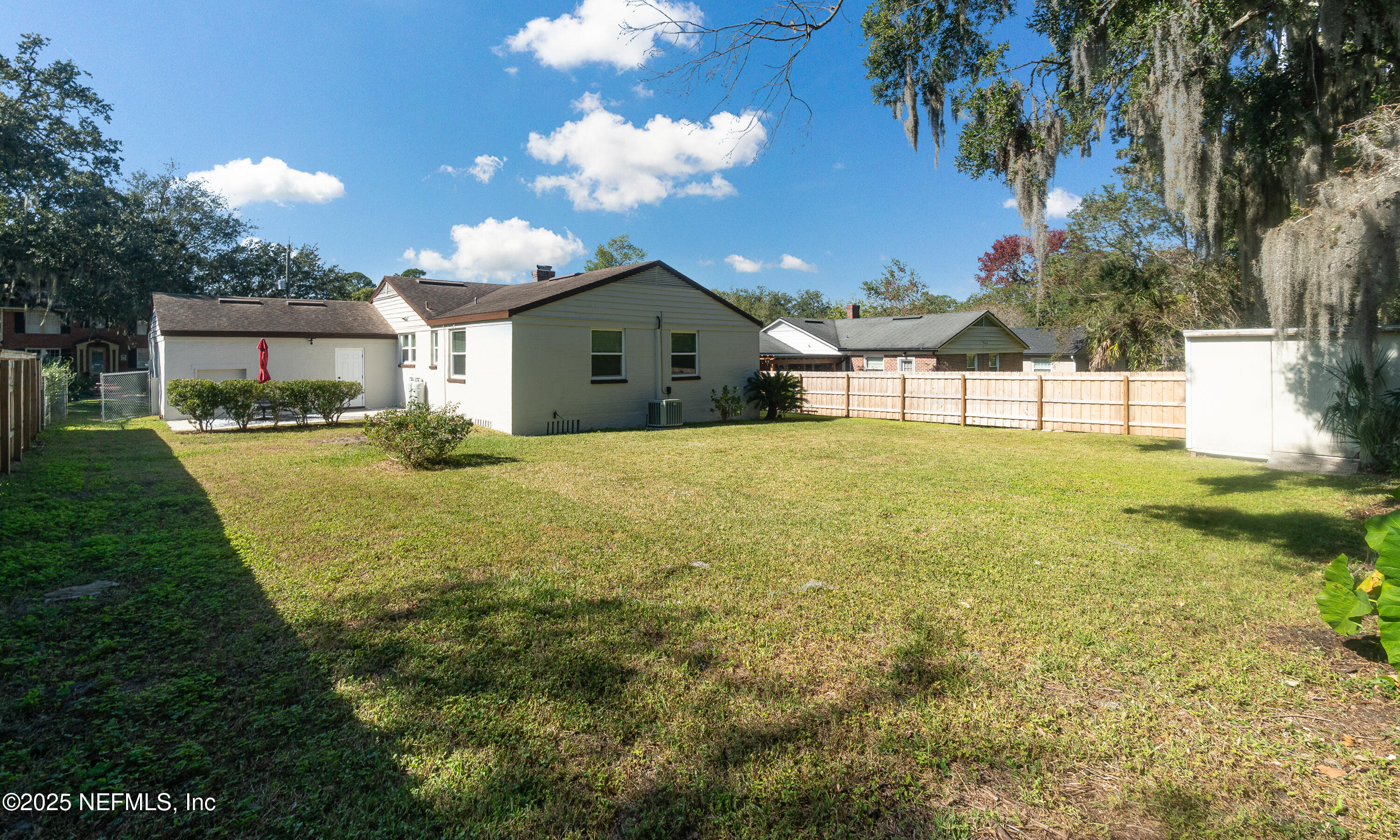 1153 Monticello Road Jacksonville, FL 32207 - Photo 29 of 37 a view of a house with a yard