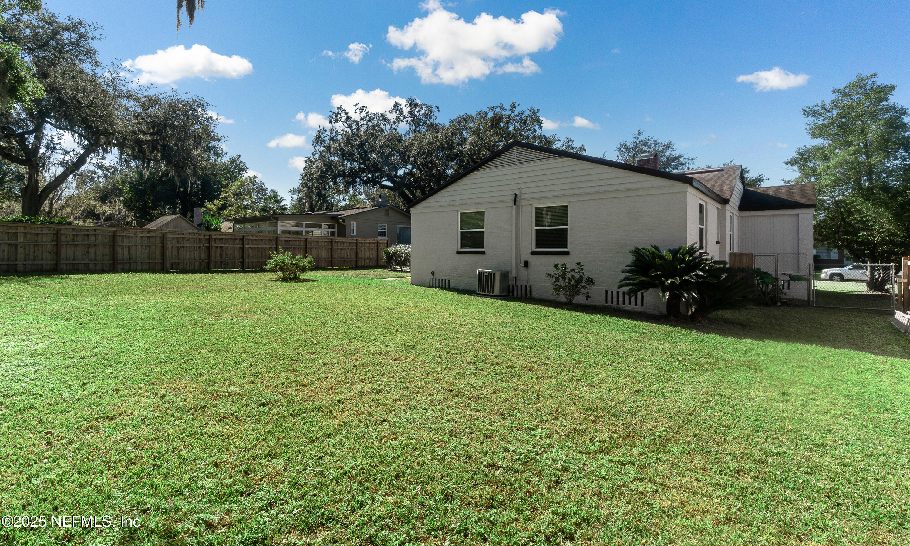 1153 Monticello Road Jacksonville, FL 32207 - Photo 31 of 37 a view of a backyard of the house