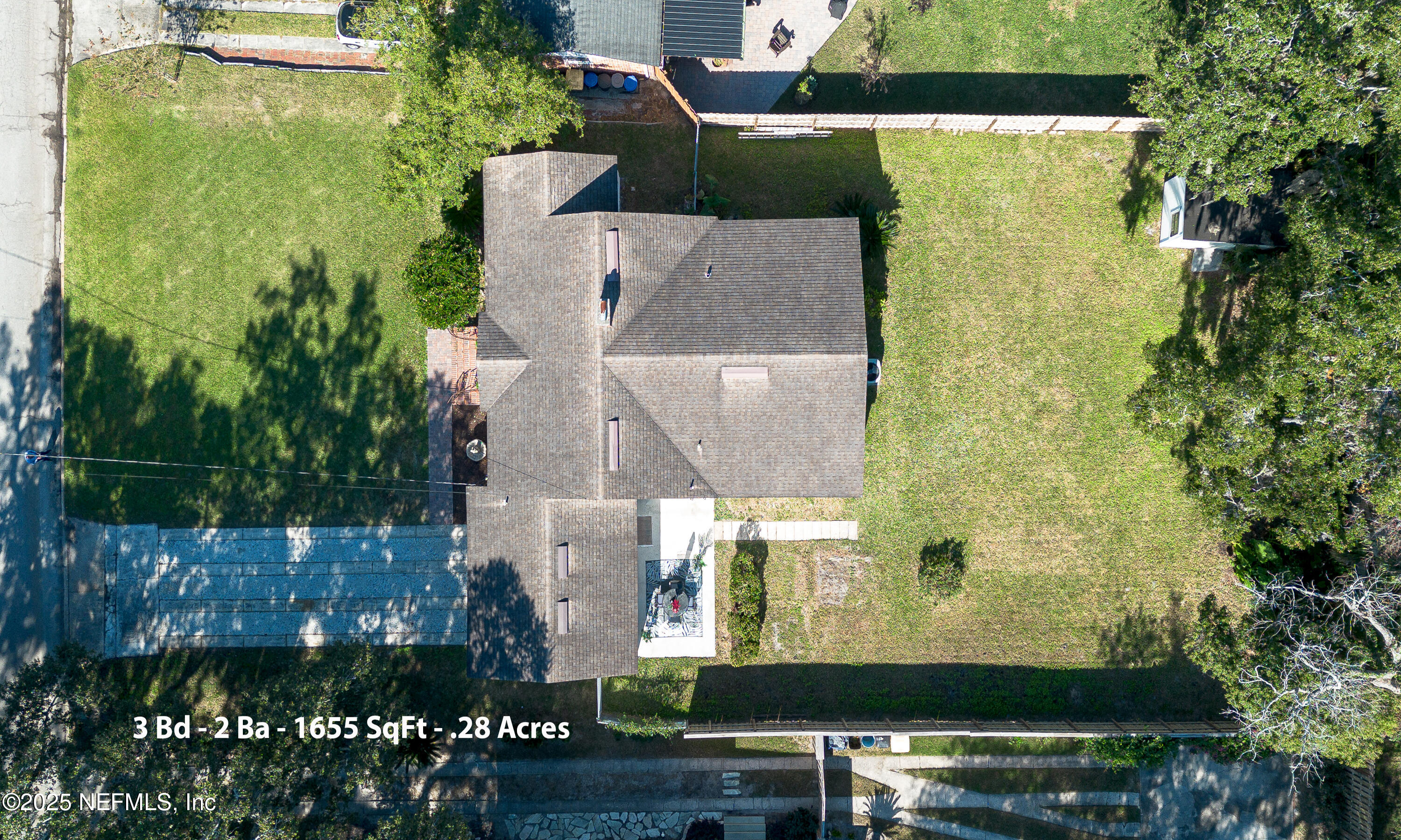1153 Monticello Road Jacksonville, FL 32207 - Photo 34 of 37 an aerial view of a house with a yard