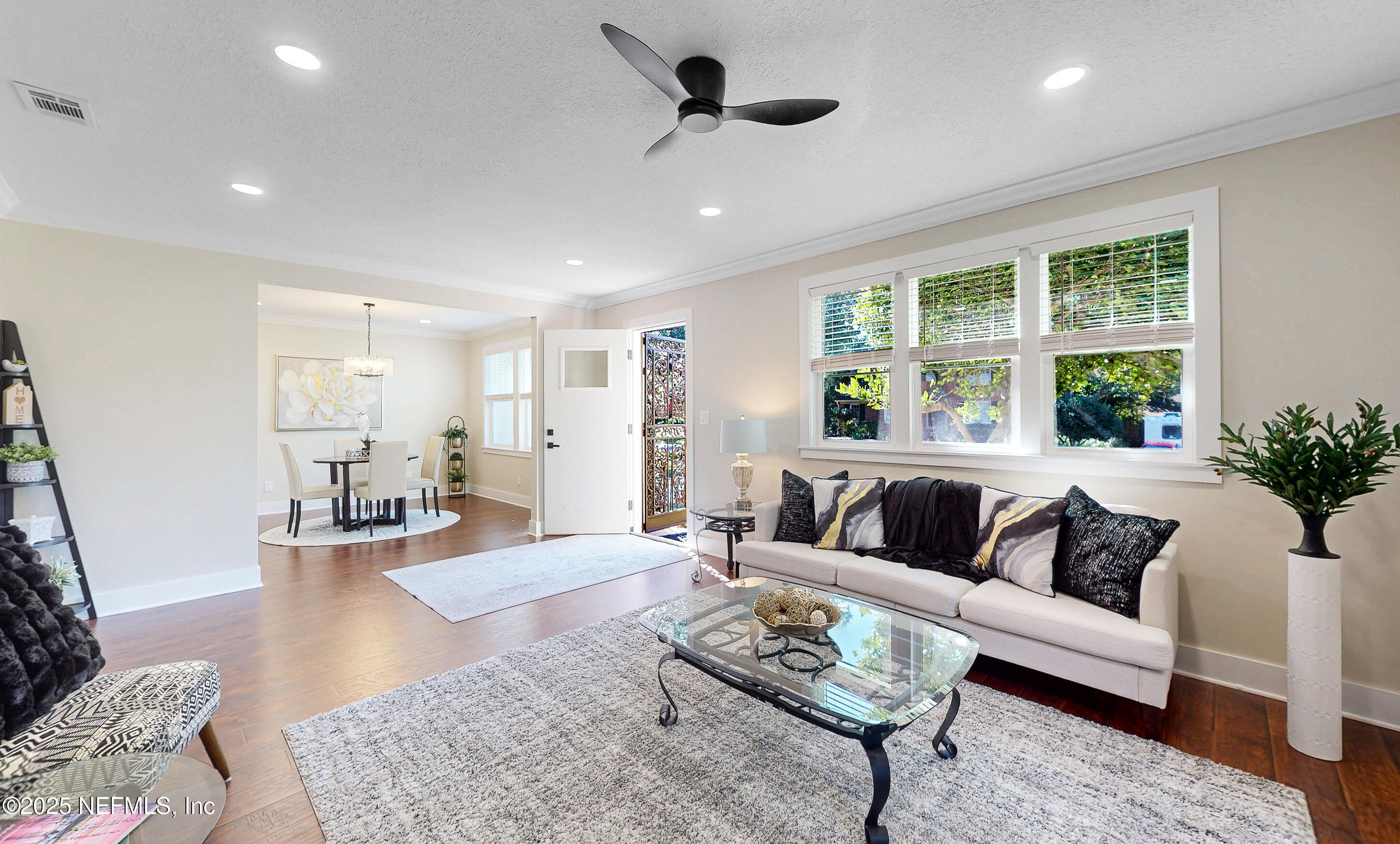 1153 Monticello Road Jacksonville, FL 32207 - Photo 5 of 37 a living room with furniture and a large window