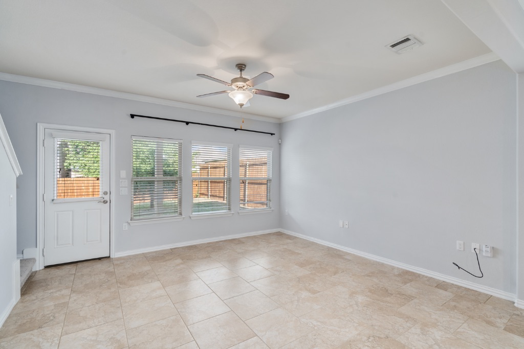 5704 Arbor Hill Lane Austin, TX 78747 - Photo 9 of 32 a view of an empty room with a window