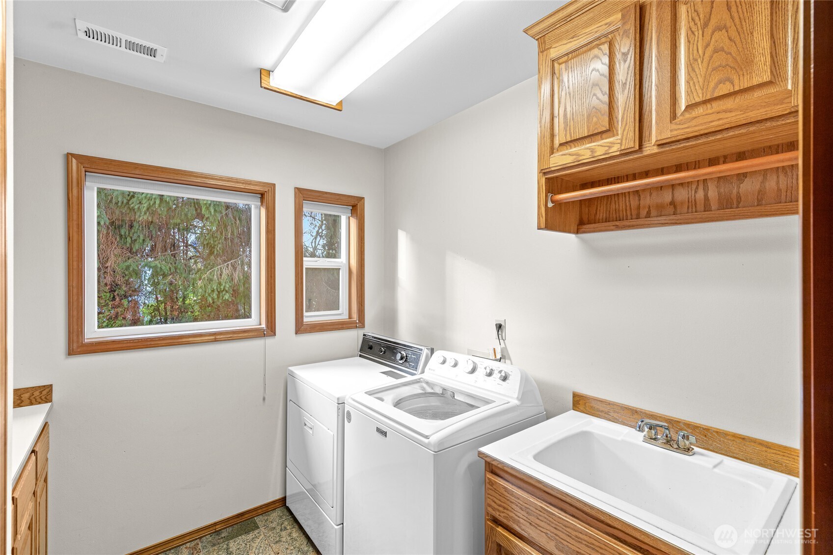 220 Southwest 292nd Street Federal Way, WA 98023 - Photo 23 of 40 a utility room with dryer and washer