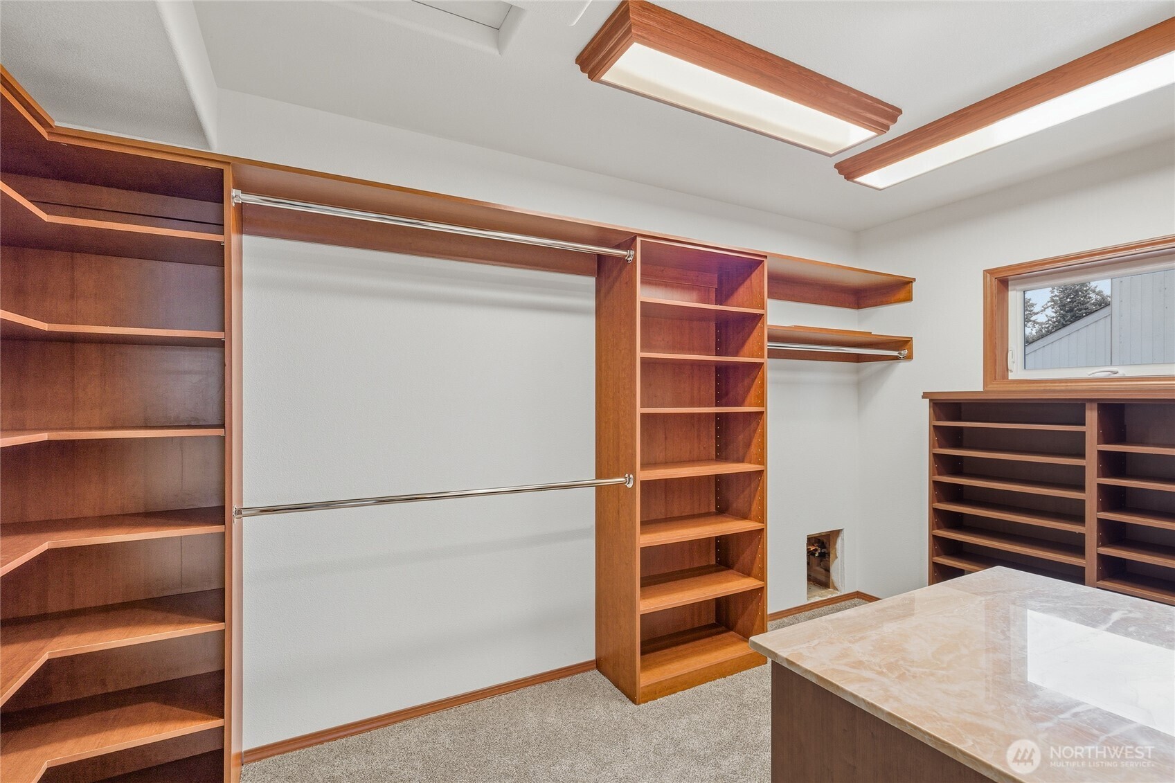 220 Southwest 292nd Street Federal Way, WA 98023 - Photo 25 of 40 a view of walk in closet with empty racks