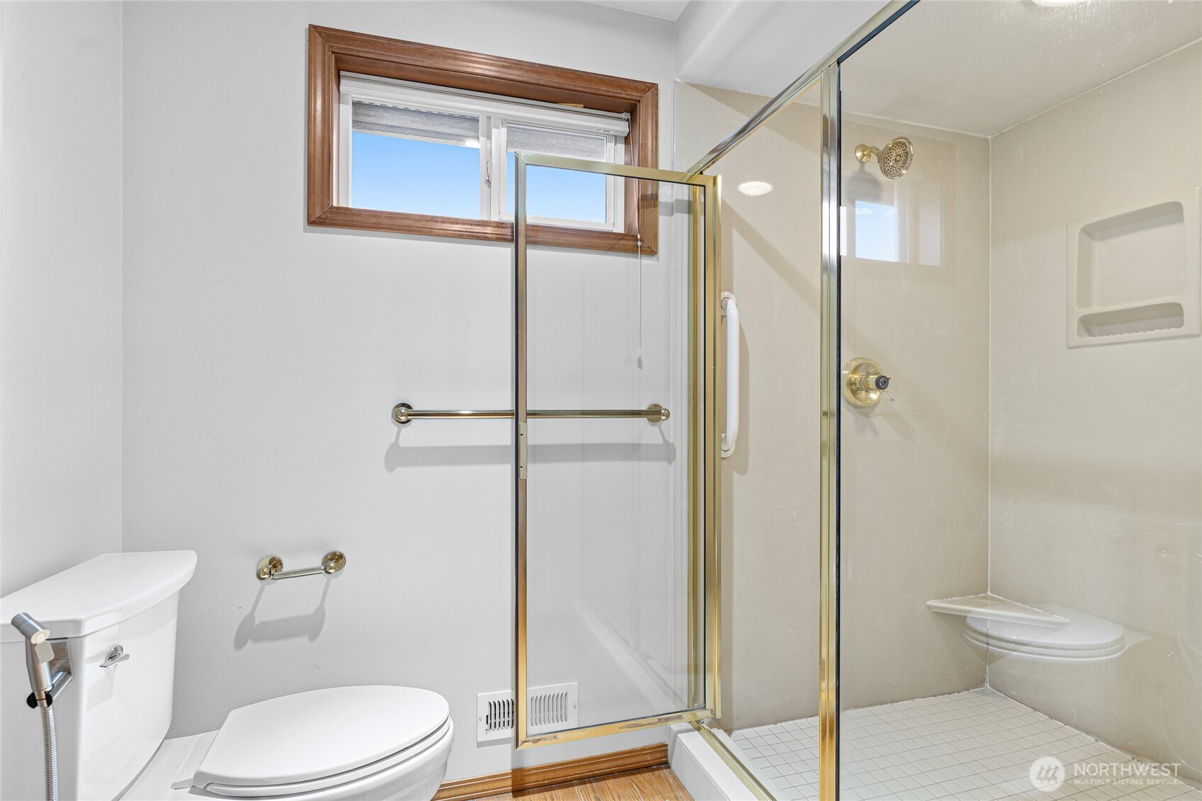220 Southwest 292nd Street Federal Way, WA 98023 - Photo 30 of 40 a white toilet sitting next to a bathroom sink