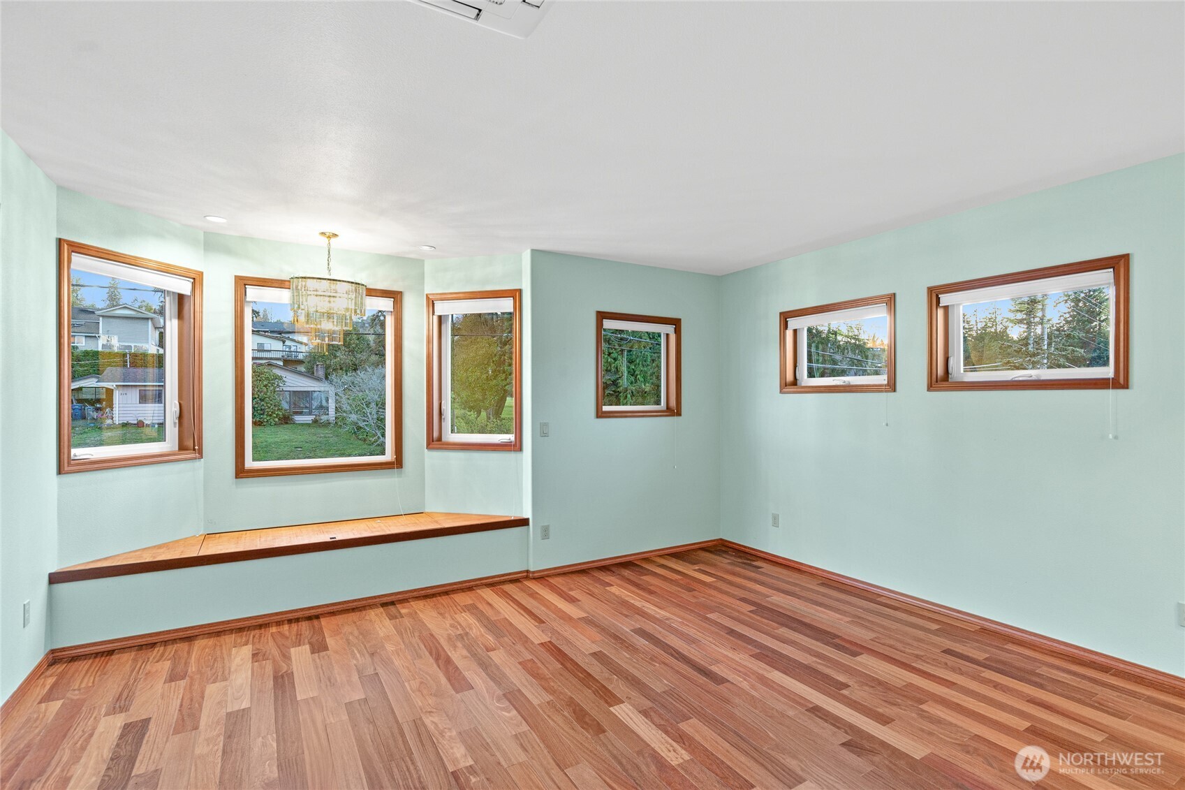 220 Southwest 292nd Street Federal Way, WA 98023 - Photo 31 of 40 a view of an empty room with a window and wooden floor