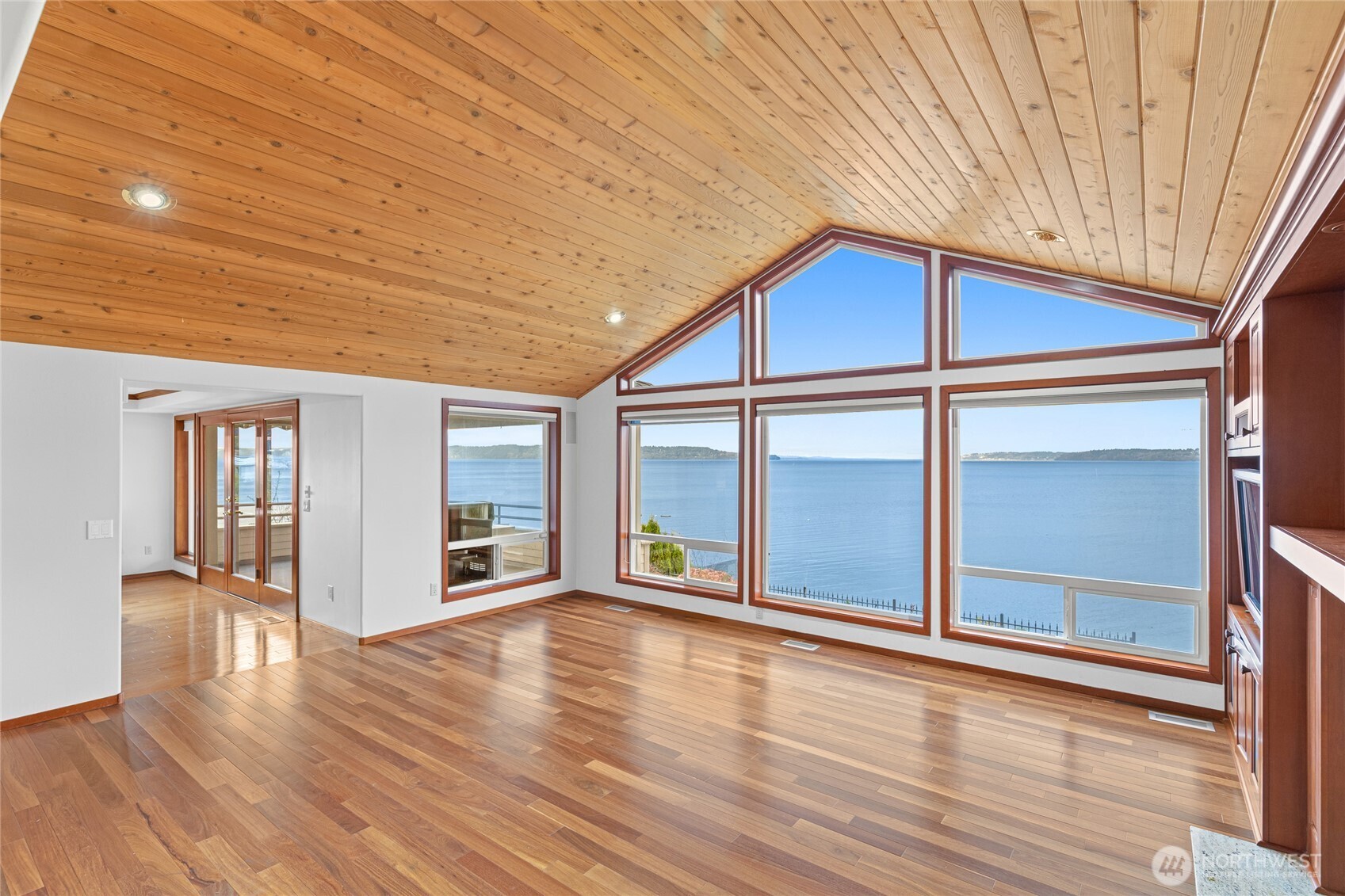 220 Southwest 292nd Street Federal Way, WA 98023 - Photo 9 of 40 an empty room with wooden floor and windows