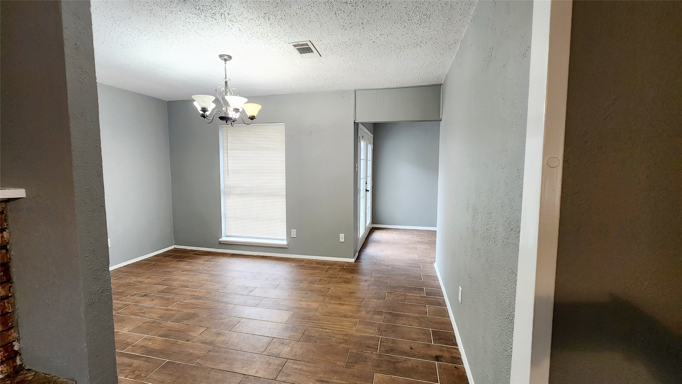 24119 Anchor Ranch Drive Hockley, TX 77447 - Photo 3 of 11 an empty room with wooden floor