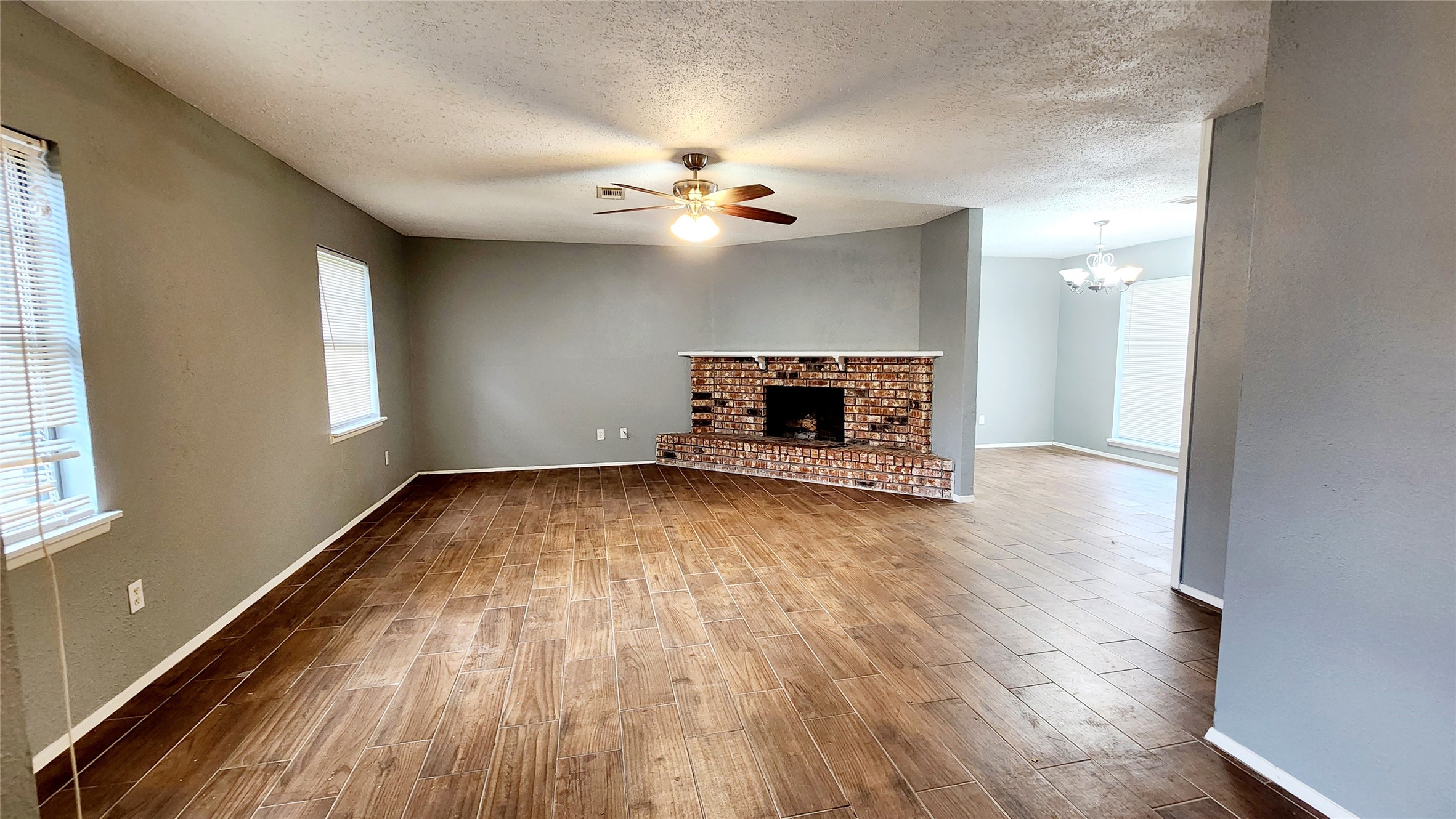 24119 Anchor Ranch Drive Hockley, TX 77447 - Photo 10 of 11 wooden floor in an empty room with a window